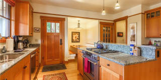 Meticulously designed Craftsman in North Beach with private beach access. Gallery 10