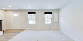 Welcome to this beautifully designed 3 level townhome in Westphalia Town Center Community! Gallery 30