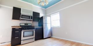 Great building with off street parking, views of the city, laundry on site! Gallery 3