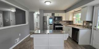 Welcome to this 4 bedroom 2 Bull Bathroom home with a Garage Gallery 6