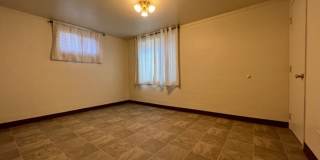 Bi-Level House w/ Massive Backyard, Storage, & Character! Gallery 20