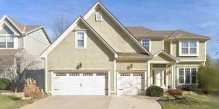 Beautiful and Spacious 4 Bed/4.5 Bath Overland Park Home with Finished Basement, 3-Car Garage, Hot Tub & Fenced Yard!! Gallery 1