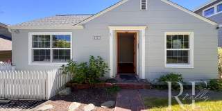 Charming 2-Bedroom Home with Renovated Bath, Hardwood Floors & Spacious Fenced Yard Gallery 1