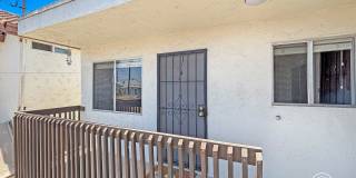 Comfortable 1BD/1BA Upper-Level Condo in North Park with Reserved Parking & On-Site Laundry Gallery 1