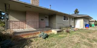 Spacious 4 Bedroom Home with Granite Kitchen, Main-Level Primary Suite, Two Living Areas & Outdoor Patio Gallery 1