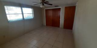 JUST REDUCED!!! 2/1.5/1 1000 Sq. Ft. NEW AC!!!Spacious living room, Lanai, fenced in yard, and tile floors thoughout! Gallery 9