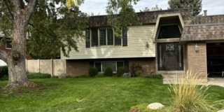 Spacious 4-Bedroom Cottonwood Heights Home with Fenced Yard & Two-Car Garage Gallery 1