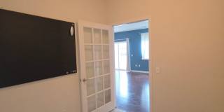 Beautiful 2nd floor (with elevator services) condominium: 2-bed, 2-bath, beautiful kitchen, bonus room, laundry room & deck! Gallery 22