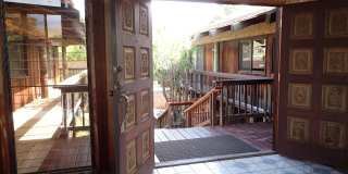 Very private, mostly furnished, rustic Maui Meadows home with large pool, walk around deck with panoramic ocean views. Available for 6 months only. Gallery 8