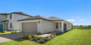 Newly constructed property offers four spacious bedrooms, two full bath in Lehigh Acres Gallery 3