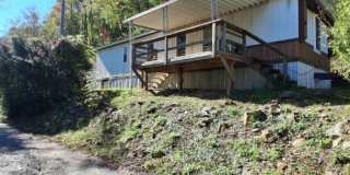 $1,800 - 2 Bedroom / 1 Bath Mobile Home Sitting on the Tuckasegee River Gallery 1