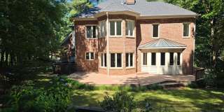 Custom Brick Home on Private Wooded Lot in Cary's Prestigious Wessex Community Gallery 32