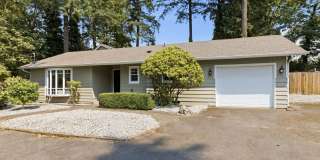 Charming 4-Bedroom Edgewood Home with Large Fenced Yard, Fireplace & Garage! Gallery 1