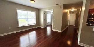 MOVE IN NOW!! Gated community Miriada! 1st floor 1X1.5 bath condo near pool area!!! Laminate wood flooring in living area and carpet in bedroom! Has washer & dryer! Gas stove & water heater! Gallery 10