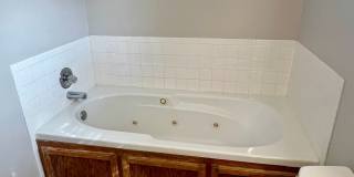4 Bed, 2 Bath with Fenced Yard, Two-Car Garage, and Jetted Tub Gallery 14