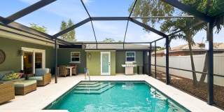 Bay Pines Pool & Spa Home with Updated Kitchen and Private Backyard Gallery 1