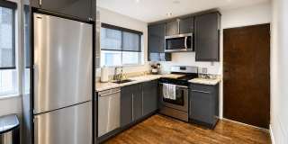 Turnkey Top-Floor Living in Gated Community Near City Park, Dining & Hospitals Gallery 1