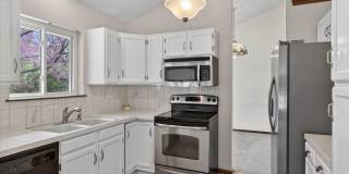 4BR/4BA Updated Home with Finished Basement Suite & Landscaped Yard Gallery 1