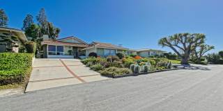 FULLY FURNISHED, CHARMING & AIRY, 4BR2BA MONTEMALAGA HILLTOP HOME W/ “QUEENS NECKLACE” VIEWS, 2-CAR GARAGE & BEAUTIFULLY LANDSCAPED, SERENE YARD CLOSE TO PARKS, SCHOOLS & SHOPPING! Gallery 1