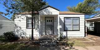 2/1/1 with 2 carports and covered patio! Gallery 1