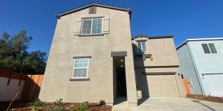 Modern 4 Bedroom 2.5 Bath Home in Gated Winding Meadow Village Gallery 1