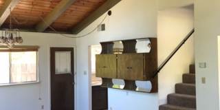 Downtown home with loft and exposed beam ceilings. Gallery 4