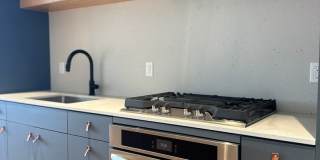 Modern Luxury Condo in the Heart of Vibrant NWX! Gallery 19