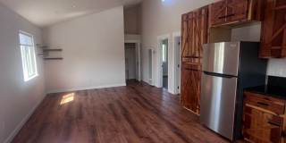 2 Bedroom 1 bath house with extra large double car garage and extra storage space! Gallery 7