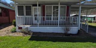 $1,350 - 1 Bedroom / 1 Bath Park Model on the Creek in Tatham Mountain Park Gallery 1