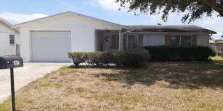 2/1.5/1 1000 Sq. Ft. Spacious living room, Lanai, fenced in yard, and tile floors thoughout! Gallery 1