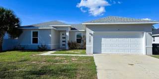 Spacious 4-Bedroom Home with Modern Kitchen  Open Living in Poinciana! Gallery 1