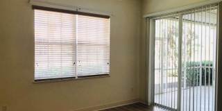 Experience Bell Tower Park. GATED ground floor 2 Bed 2 Bath Den 1 Car Garage Condo. Gallery 43