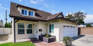 Charming 4-Bedroom Artesia Home with Sunroom, Large Backyard  Attached Garage Gallery 1