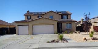 Spacious 4 Bedroom with RV Access in Rosamond Gallery 1
