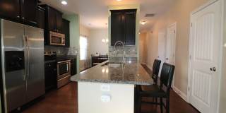 Gorgeous END UNIT 3 bedroom town home in desirable Harpers Mill with Garage and Primary on main with walk-in shower!! Gallery 6