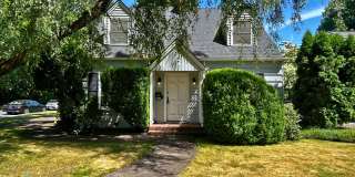 Charming 4 Bedroom Home with Hardwood Floors, Gas Fireplace & Large Fenced Yard Gallery 1