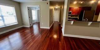 MOVE IN NOW!! Gated community Miriada! 1st floor 1X1.5 bath condo near pool area!!! Laminate wood flooring in living area and carpet in bedroom! Has washer & dryer! Gas stove & water heater! Gallery 8