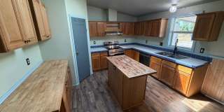 **MOVE IN SPECIAL** 2.5 Acres with Barn across from Lacomb School! Gallery 1