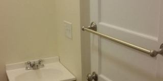 Nicely updated ground level 1 bed with in-unit laundry near the Green Line. Gallery 7