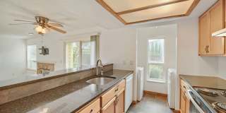 AVAILABLE NOW! 2BR/2BA Condo – Awesome Location! Glossy Hardwoods, Granite Countertops, W/S/G Included!! Gallery 1