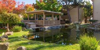 Modern 2-Bedroom Condo with Pool and Koi Pond Views Gallery 36