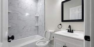 Modern 3BR Rowhome with Finished Lower Level & Rear Deck Gallery 9