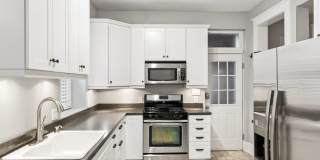 Stunning 1st floor condo located in the heart of highly sought after West Ghent featuring 3 bedrooms and 2 full bathrooms! Gallery 11