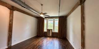Amazing studio in the William Farrington Buildiing.  UTILITIES INCLUDED EXCLUDES CABLE AND INTERNET.  Pets not allowed.  One car parking in garage included. Gallery 10