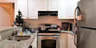 Nicely renovated 3 bed on the Green Line in Brookline. Gallery 1