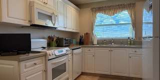 Furnished 2 BR , 2 Bath condo - with Heated Pool and Security Gate Gallery 12