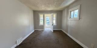 Charming 2-Bedroom Home with Secure Front Porch, Carport & Big Yard in Goodyear Heights Gallery 3