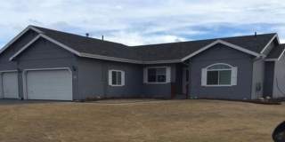 Ranch style 3 bedrooms with an office Plus a 3 car garage and large back yard complete with greenhouse and large shed! Gallery 1