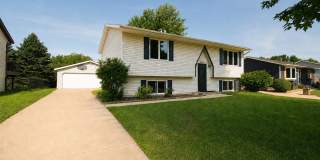 NW Rochester Split-Level with Vaulted Ceilings & Detached 2-Car Garage Gallery 1