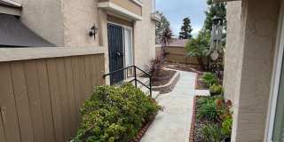 Spacious 2bd/2 bath with private patio in the heart of Paradise Hills.  2 carport spaces Gallery 1